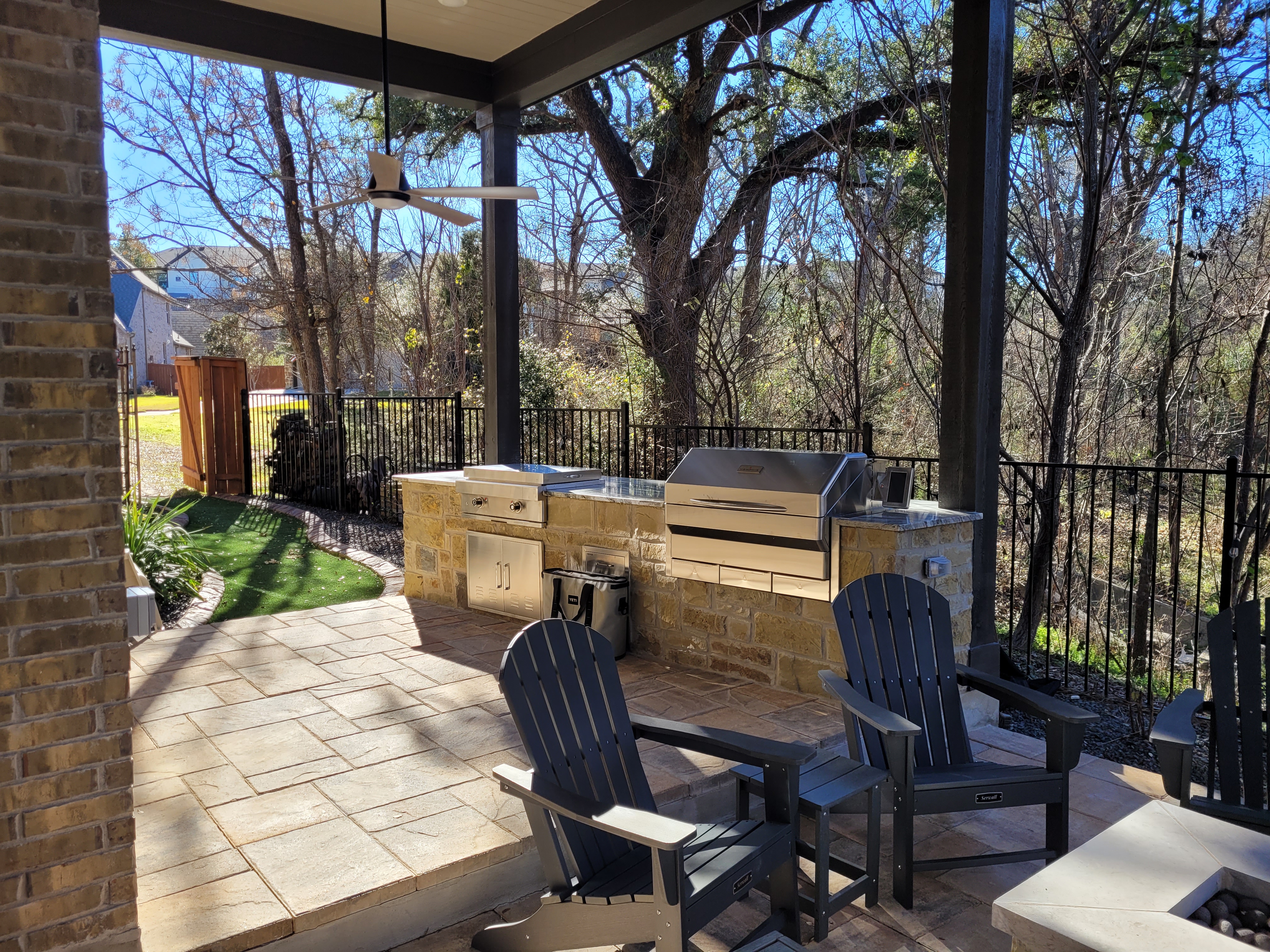 Custom outdoor kitchen with grill, smoker, and prep counters built by KDC Designs in Central Texas